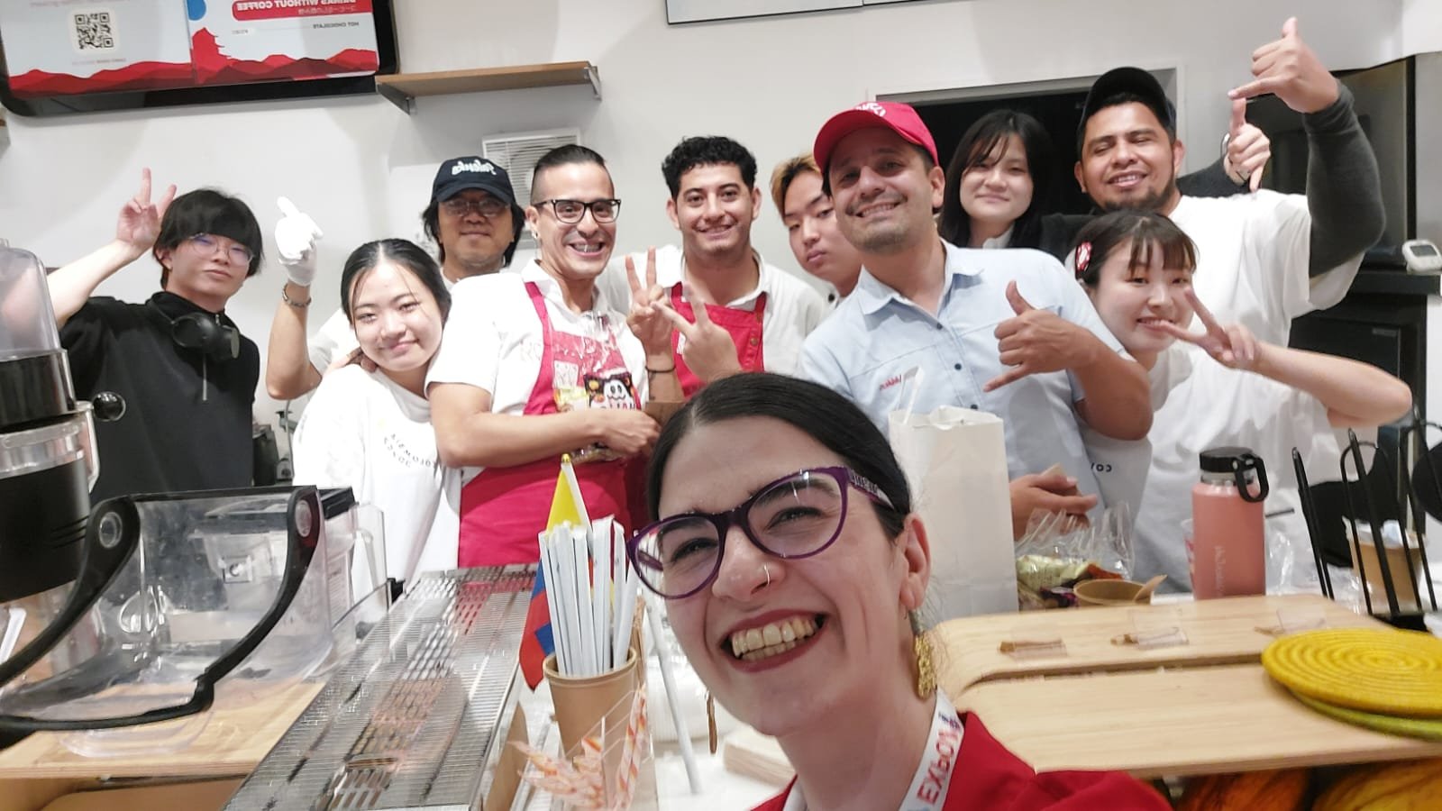 Our team at the counter in the Colombia pavilion, Expo Osaka 2025