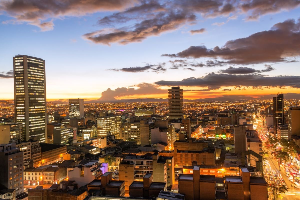 Bogotá city skyline lit up at sunset